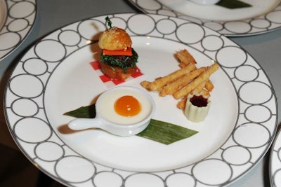 Dessert was a “hamburger” made with a brioche bun, a fig and date patty, and almond marzipan, served with fries of toasted sponge cake and raspberry “ketchup.”
