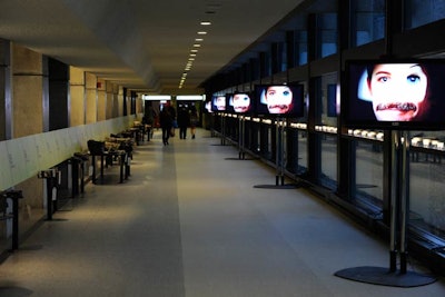 Shifting faces (screened on LG TVs) toyed with guests' senses as they made their way to exhibition hall for the three-course dinner.