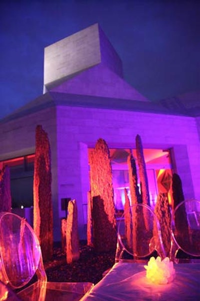 Ghost chairs added a contemporary element to the traditional rock garden in the courtyard outside the main level of the chancery of the People’s Republic of China's embassy.