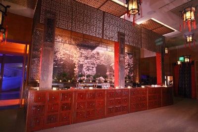 The ballroom’s two large bars displayed details like carved wood and images of pagodas as their backdrops.