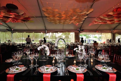 Ball centerpieces included arrangements of white orchids in clear glass vases.