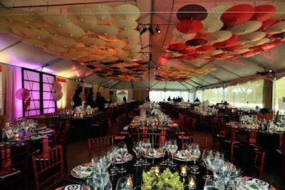 For the ball on Thursday, Japanese paper parasols hung from the ceiling of the tent.