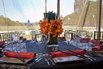 The luncheon tabletops were simpler than those at the ball, with white plates and smaller centerpieces.