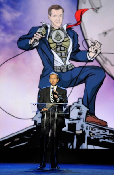 NBC Nightly News anchor and Robin Hood Foundation board member Brian Williams hosted the evening's program. Like other presenters, the TV personality's appearance on stage was accompanied by an animated superhero version on-screen.