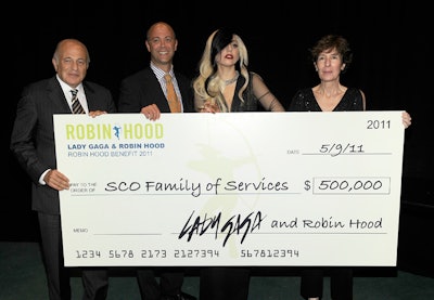 The contest hosted by Lady Gaga and Robin Hood allowed the public to vote for one of five charities targeting local youth. The winner, SCO Family of Services, was announced at the gala and the performer presented the first of two $500,000 grants at the event.