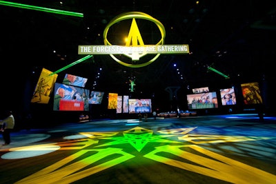 The centerpiece of the cocktail section was an enormous sign depicting the event's arrowhead symbol and tagline. Oversize illuminated arrows pointed outward from this point, guiding guests to sections themed around the issues the foundation works on.