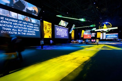 Animated graphics displayed on the video screens throughout the highlighted important information about New Yorkers in need of food, shelter, and education.