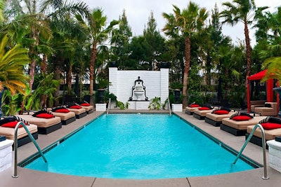 The pool deck at the Artisan boutique hotel is lined with three cabanas that come with ceiling fans and 32-inch plasma TVs.