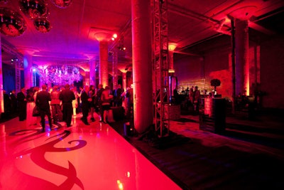 Guests danced on a slick central floor.