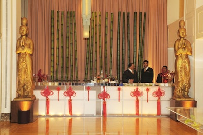 Chinese tassels, bamboo, and golden statues spruced up the bar.