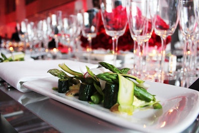 The dinner menu included a starter of asparagus tips, shaved asparagus, roasted baby courgettes, tiny radishes, and truffle vinaigrette garnished with chopped egg.