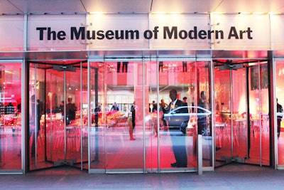 For the second year, the Museum of Modern Art opted to bring guests through the garden's entrance on 54th Street, rather than guiding them through the main hall of Ronald S. and Jo Carole Lauder Building. Entering from this area, attendees (and curious passersby) got a sneak peek of the dinner setup (pictured).