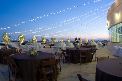 The 6,300-square-foot Suntrust Terrace at the Orlando Science Center is draped in a canopy of white lights. It's one of the largest rooftop spaces in Orlando.