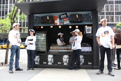 Modeled after traditional sidewalk newsstands, Ion's structures are stocked with edible goodies, including candy, snacks, and beverages, as well as newspapers and water bottles.