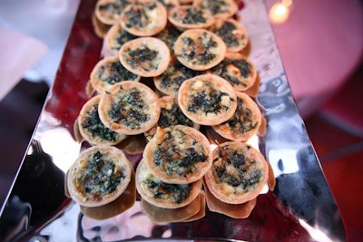 Passed hors d'oeuvres included spinach and goat cheese tartlets, smoked salmon, and mini crab cakes.