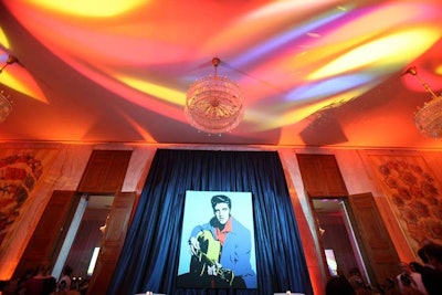 Oversized paintings of rock icons like Elvis Presley, Janis Joplin, and Jimi Hendrix decorated the walls of the three dining rooms and cocktail area.