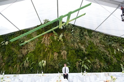 To cover the rear wall of the tent, which stood just six feet from 10th Avenue, Van Wyck & Van Wyck created a vertical garden bed of huckleberry, privet, rye, and an array of grasses and ferns.