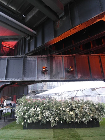 Beneath the High Line at 30th Street and 10th Avenue, the Friends of the High Line hosted their annual fund-raiser, which brought more than 900 guests to the west Chelsea location. Following a preview walk on the new section of the elevated park, attendees headed to the cocktail area set up beneath the former railroad.