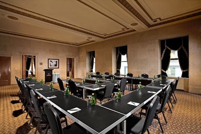 The Manager's Boardroom combines classic details like original crown molding with modern furnishings.
