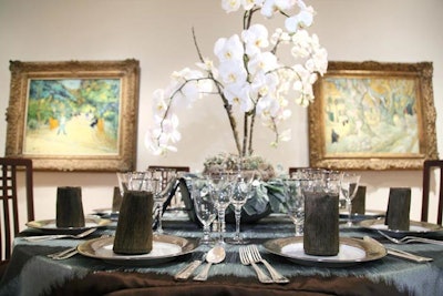 Another gallery had more earthy decor with dark brown and soft blue linens, brown napkins, and pure white orchid centerpieces.