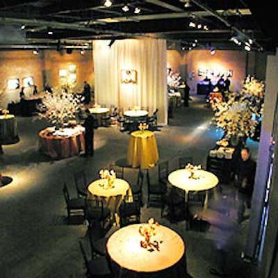 Event production company Silver Birches decorated Eyebeam Atelier with large floral arrangements and photographs from the final scenes of classic films for Dreamworks' premiere party for Woody Allen's new film, Hollywood Ending. (Photo courtesy of Levy Lighting)