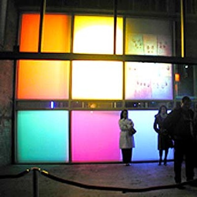 Levy Lighting recreated the colorful grid pattern of the film's promotional poster on Eyebeam Atelier's glass entry area. (Photo courtesy of Levy Lighting)