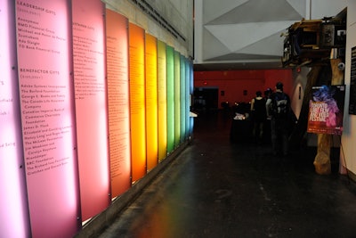 Festival benefactors were listed on the walls, which were lit in rainbow hues.