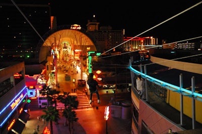 Flightlinez Las Vegas at the Fremont Street Experience allows participants to cruise right through the glittering lights on a 30 mph zip line tour.