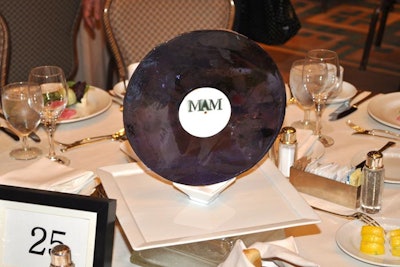 Pastry chefs from the Four Seasons created centerpieces that looked like vinyl records but were made completely from sugar.