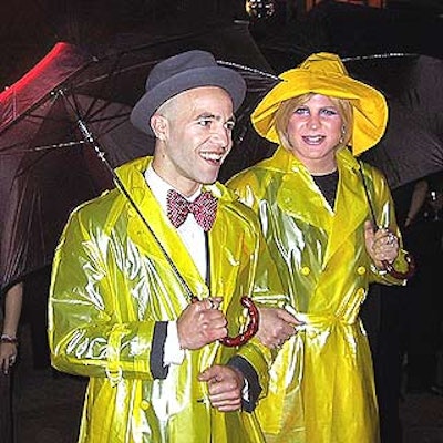 Costumed actors hired by Chi Chi Valenti--including this pair attired in Singin' in the Rain costumes--strolled through the crowd at the New York Public Library's movie musical-themed Young Lions benefit.