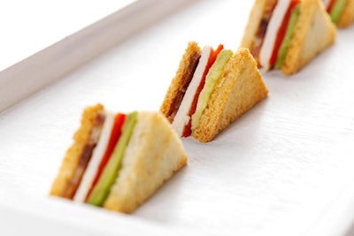 Mini club sandwiches with house-smoked bacon and chicken and bread baked in-house, from Callahan Catering in New York