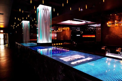 An elevated runway, which can be used for fashion shows, has embedded LED screens that can broadcast logos, pictures, videos, or customized colors.