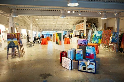 The warehouse-like space's third floor was a makeshift art gallery where guests could buy works from Artists for Humanity apprentices.