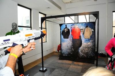 More booths filled Skylight West's sixth-floor space, including a set up from Under Armour. The sports clothing company showcased its new collection of water-resistant gear by allowing attendees to spray the garb with Super Soakers.