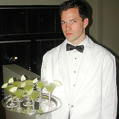 A waiter from the Upper Crust served frozen appletinis during the 'cool phase' of the Council of Protocol Executives meeting at 91.