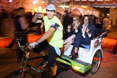 The shop for National Pedicabs is in Blagden Alley, right next to the party’s outdoor space, and some guests went for a spin.
