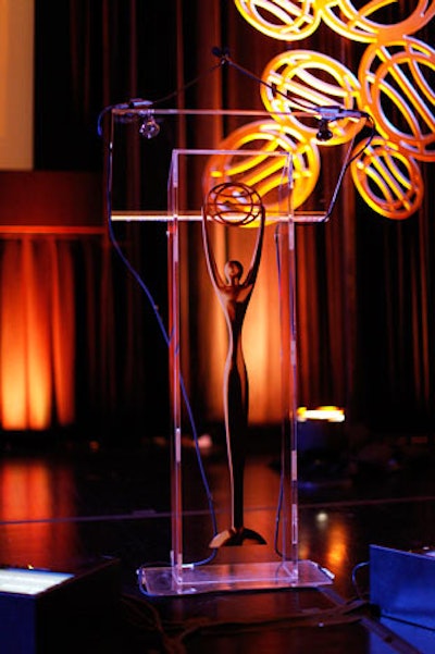 An image of the Clio statuette decorated the stage's lectern and informed the design of the stage's paneled backdrop.