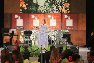 The stage also held some garden-inspired design elements, including potted plants at the foot and a backdrop of floral imagery. Fragrance Foundation president Rochelle Bloom opened the award portion of the night, which despite an issue with power, offered a lively lineup of well-known faces as presenters, including Private Practice actress Kate Walsh, former White House social secretary Desirée Rogers, and chef Cat Cora.