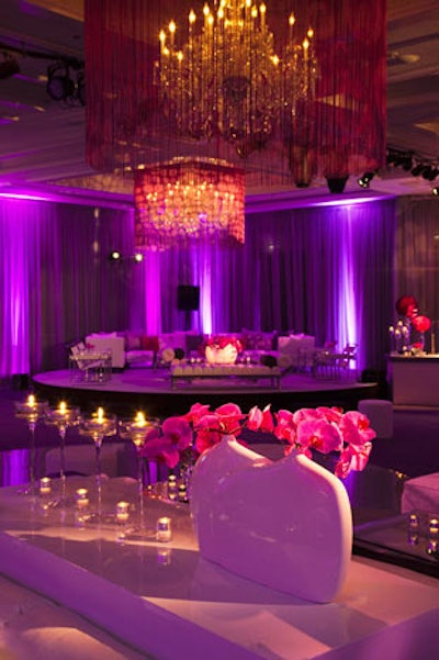Existing chandeliers were surrounded in purple fringe to 'bring modern edge to the room,' Cowie said.
