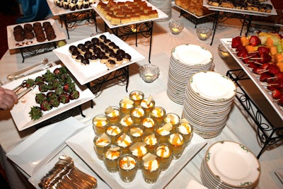 The hotel set up a dessert buffet filled with chocolate-covered strawberries, mini brownies, éclairs, and more in the state room, where the cocktail reception took place earlier in the evening.