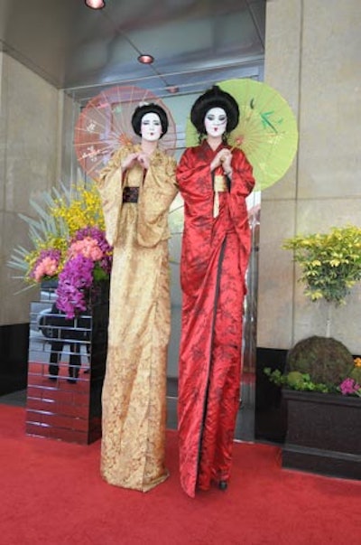 Stiltwalking geishas greeted guests on the red carpet.