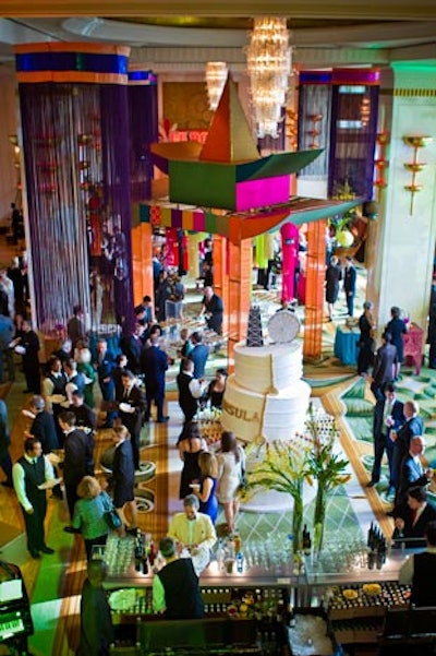 A dessert reception took place in the lobby, where a giant page-cap-shaped birthday cake stood in the center of the space. The cake was based on the attire of Peninsula staffers.