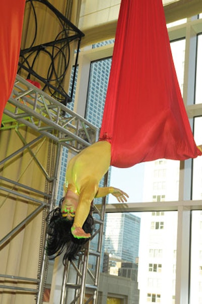 Aerialists from Aloft descended from the ceiling.