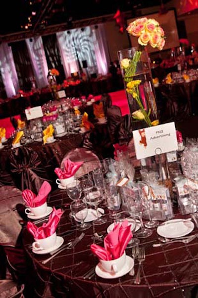 Gold Productions used a mix of brightly colored napkins on each of the 52 tables to accent the chocolate satin tablecloths.