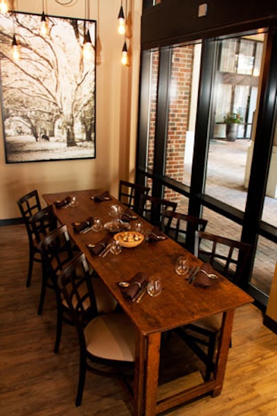 A small rectangular alcove in the rear of the restaurant has windows that look out onto the 55West plaza.