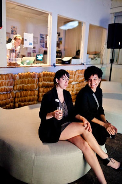 Comfortable seating was provided inside the factory, where loaves of bread lined the walls.