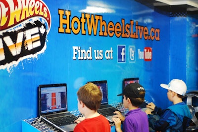 Inside the Hot Wheels Garage trailer, guests could use laptops to explore the Hot Wheels Live Web site, play games, and check out the brand's Twitter and Facebook pages.