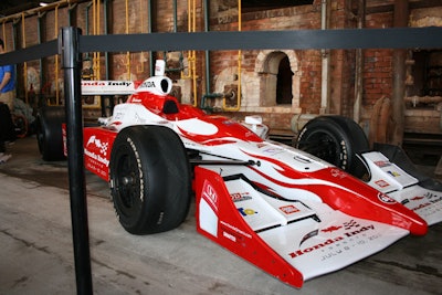 Honda Indy cars were on display, set against the background of the old factory kilns at the Brick Works.