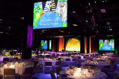 Large screens flanked the stage in the main dining space, where 100 tables provided seating for 1,000 guests.