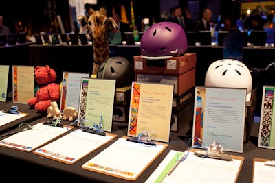 The 90 silent-auction items were divided by category, making shopping easy for guests.